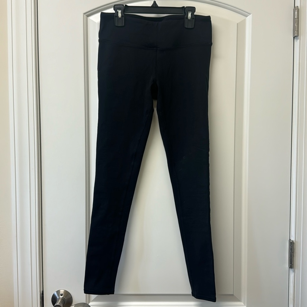 Alo Yoga leggings with sheer back panel up each side of legs size small